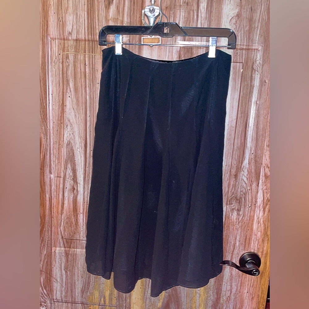 Black knee length pleated skirt